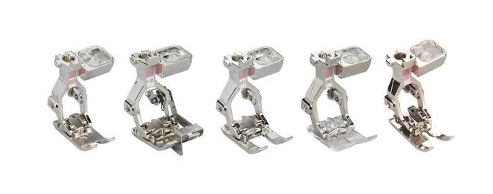 Set of five metal sewing machine presser feet on a white background 031662.71.01