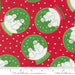 Snow Time Poinsettia Red Snowglobe fabric shown beside a ruler to display the print scale and repeat width