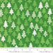 Snow Time Evergreen Christmas Trees fabric shown beside a ruler to display the print scale and repeat width