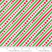 Snow Time Winter White Dotted Bias Stripe fabric shown beside a ruler to display the print scale and repeat width