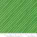 Snow Time Hollyleaf Dotted Bias Stripe fabric shown beside a ruler to display the print scale and repeat width