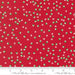 Snow Time Poinsettia Red Jolly Dots fabric shown beside a ruler to display the print scale and repeat width