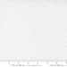 Snow Time Winter White on White Tinsel fabric shown beside a ruler to display the print scale and repeat width