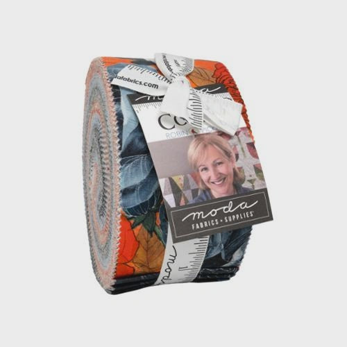 Coven fabric collection Fabric roll with colorful pattern and Moda label on a white background