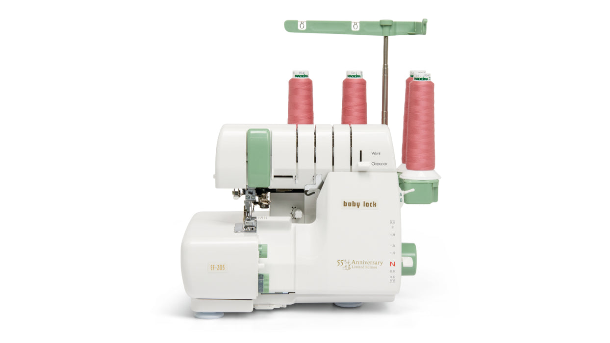Baby Lock 55th Anniversary Limited Serger Machine with colorful spools of thread 