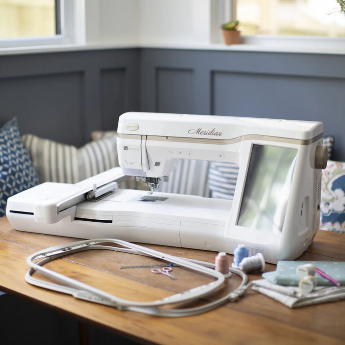 Baby Lock Meridian embroidery machine with hoops