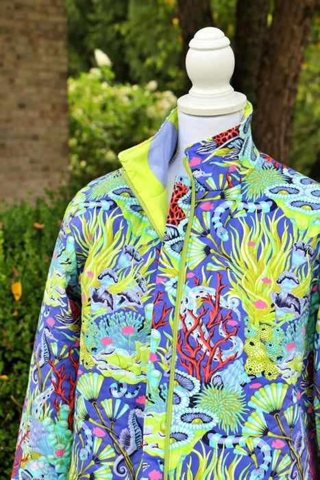 Colorful jacket with marine pattern on a mannequin against a blurred outdoor background Bella Quilt Coat pattern 