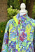 Colorful jacket with marine pattern on a mannequin against a blurred outdoor background Bella Quilt Coat pattern 
