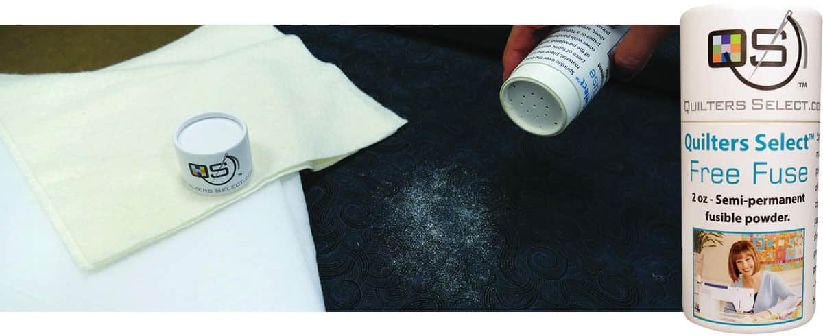 Applying Quilters Select Free Fuse Powder between fabric layers before pressing – semi-permanent bond for quilting and applique
