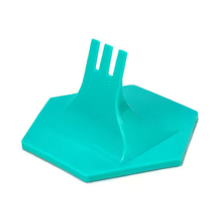 Turquoise zipper jig on a white background