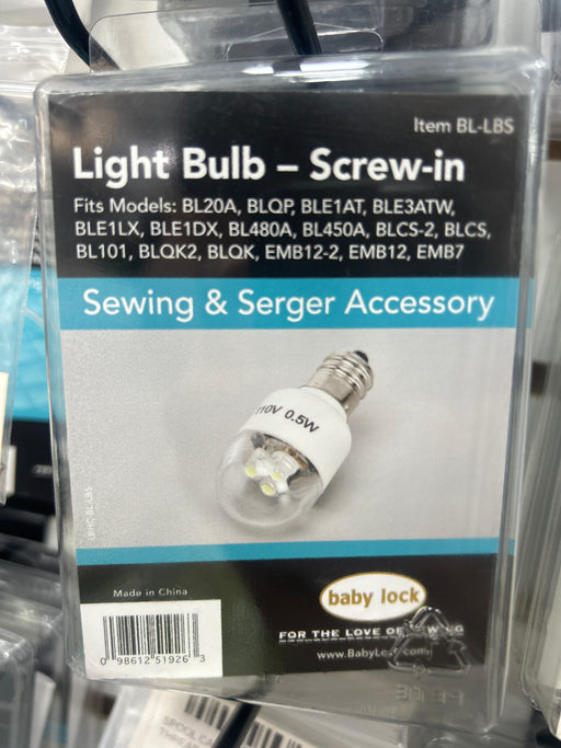 Baby Lock Light bulb screw-in accessory packaging with brand logo on a reflective surface