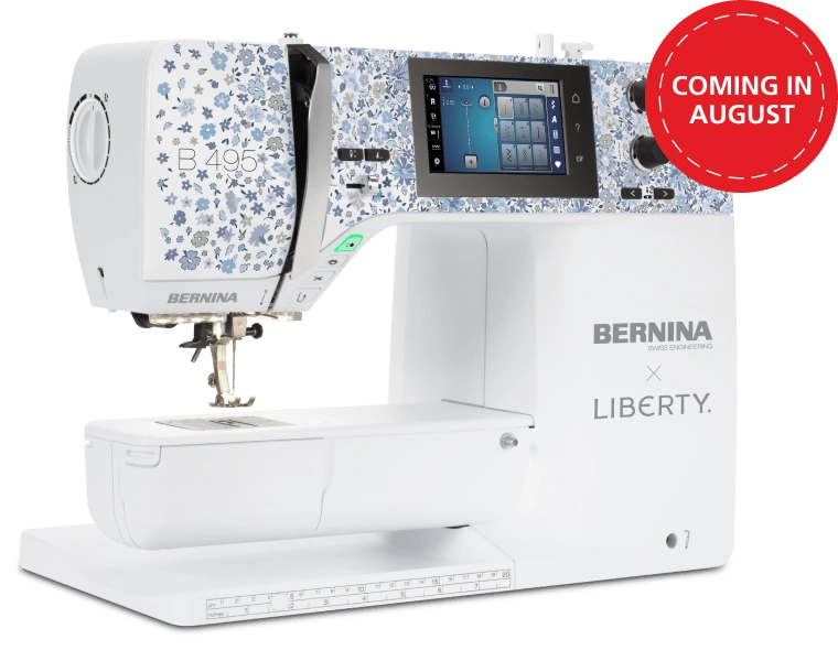 Bernina sewing machine with Liberty fabric design, 'Coming in August' label.