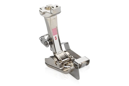 Bernina #5 blind stitch presser foot, typically used for creating invisible hems on fabric.