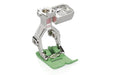 Bernina #52D Zigzag Presser Foot with a non-stick sole, primarily metallic in color with a green base.