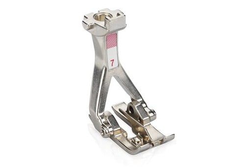 Bernina #7 Tailor Tack Presser Foot, primarily silver in color, designed for creating precise seam markings and decorative effects on fabrics.