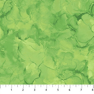 Mirage Green Apple quilting cotton by Deborah Edwards for Northcott — fresh bright green fabric shown with ruler for scale