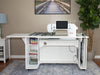 Horn of America Model 9030 white Sewing Cabinet with Bernina 990 sewing machine on it