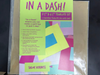 In a Dash! quilt template set by Shloe Kerness, two layer cake–compatible acrylic templates in 8.5" and 4.5" sizes with instruction booklet