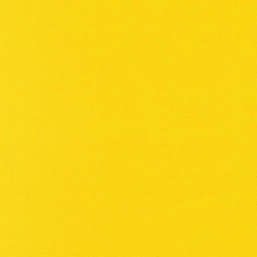 Citrus Kona Cotton solid fabric by Robert Kaufman. 100% cotton fabric in a vibrant yellow color.