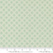 Fabric pattern with a lattice design on a light green background, featuring the Moda Fabrics logo.