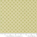 Fabric swatch with geometric pattern on a green background, featuring the Moda Fabrics logo.