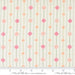 Floral pattern fabric with a ruler for scale on a white background