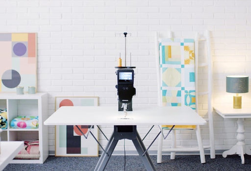 Bernina Q 16 sit down machine