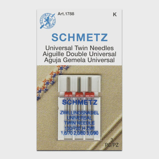 Schmetz universal twin needles assorted size 3 pack packaging on a beige background